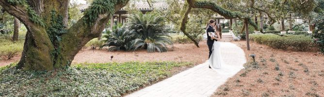 a couple on a walkway staring into each others eyes